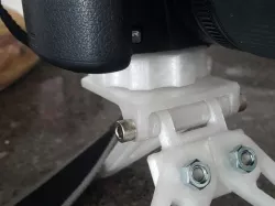 Tripod to camera adjuster knob