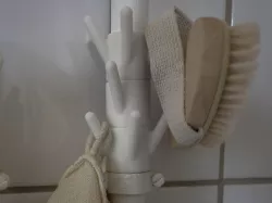 Towel hook, snaps onto waterpipe