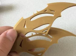 Batarang with superman logo