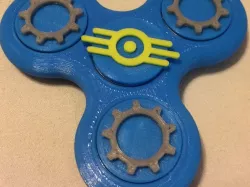 Fidget Tri-Spinner with Themed Bearing Caps