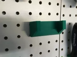 Makita battery holder for pegboard