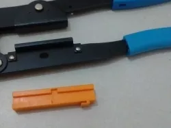 Base of plier to crimp flat cable connector