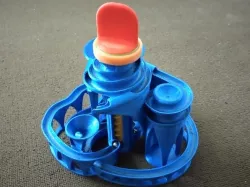 Big button for easy spin to the cyclone: triple lift triple track marble machine