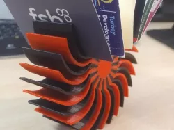 Dual color/material spiral business card holder