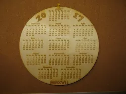 2017 Lasered Calendars.   4" Cubes.   10" Disc.