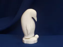 Jean Gordon's carving Penguin with (and without) egg