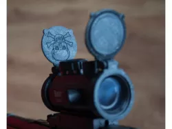 40mm flip up scope caps with Bad Ass Skulls on them!
