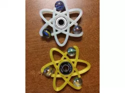 Atom and Curved Marble Spinner