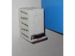 Battery dispenser with wall mount holes
