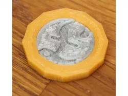 Shopping trolley pound coin (round and dodecagon)