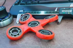Large quad offset angled fidget spinner. 