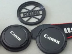 Double lens cap holder