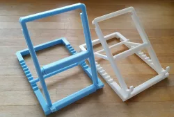 Adjustable-angle tablet-stand with print in place hinges