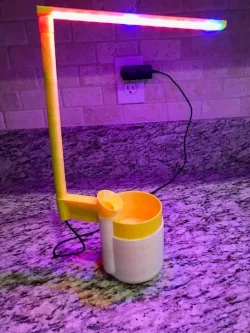 Grow light for self watering flower pot