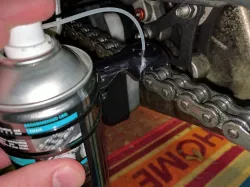 Motorcycle chain oiler