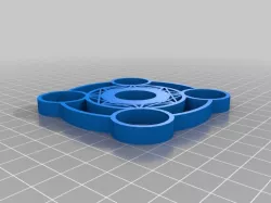 Orbital fidget spinner with finger caps and stand