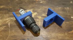 Cordless drill motor mechanism bracket