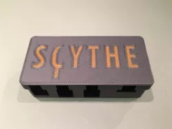 Scythe Coin Holder