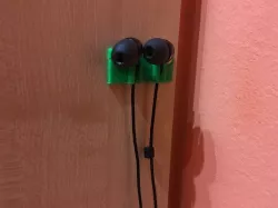Wall earbuds holder.