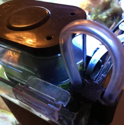 Hose guide for automatic water level controller