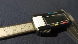 Caliper battery cover