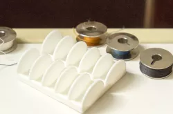 minimalistic thread bobbin holder