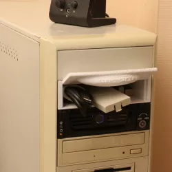 Box fitting into a computer's 5¼ disc bay