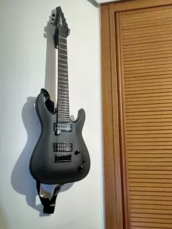 7 string guitar wall holder (with Gojira logo)