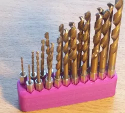 Drill bit stand / holder for hex shank drill bits. Easy to modify.