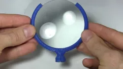 Magnifying glass holder with socket