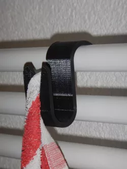 Simple towel hook for a bathroom heater