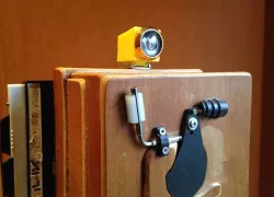 Viewfinder with door peephole for pinhole camera