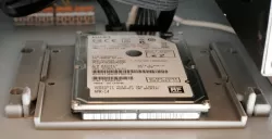 2.5 and 3.5 hard drive holder for surface mounting with quick release mechanism