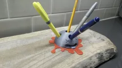 dead head pen holder with blood pool