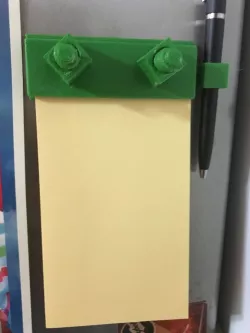 Fridge magnet with ballpoint hole