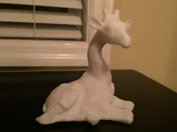Giraffe Sitting
