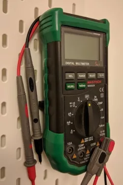 Multimeter holder for IKEA SKADIS pegboard