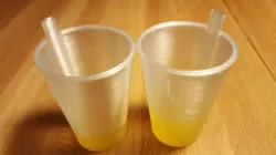 Childrens' cup with built in straw