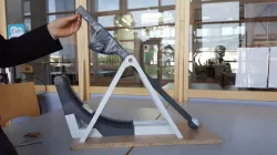 Golf-catapult physics experiment