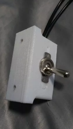 Toggle switch holder