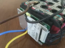 Battery management system (BMS) holder