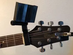 Guitar neck phone holder