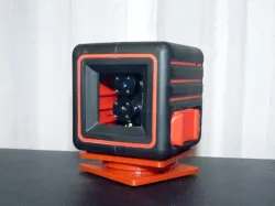 Rotating base for laser leveler (ADA cube)