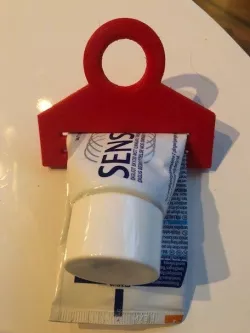 Toothpaste squeezer / holder