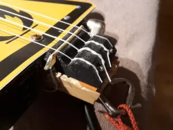 Ukulele bridge for subsaddle pickup