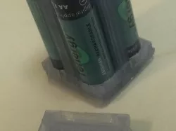 AA Battery pack holder with slots for contacts and wire holes