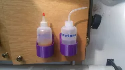 8 Oz. Squeeze / Storage Bottles Holder from Harbor Freight.