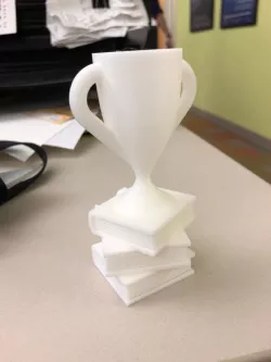Trophy on Stack of Books