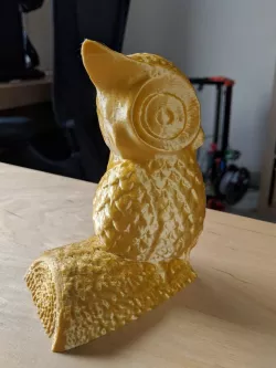 Owl bookend on a log