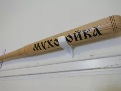 Baseball bat wall hanger